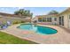Backyard pool area with brick pavers, a pool, and access to the home's patio and outdoor spaces at 9309 120Th St, Seminole, FL 33772