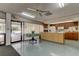 Kitchenette area featuring basic appliances, ample counter space, and easy access to the outdoor pool area at 9461 Harbor Greens Way # 502, Seminole, FL 33776