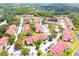 Overhead shot of a community featuring cozy townhomes, manicured lawns, and convenient parking at 9481 Highland Oak Dr # 1310, Tampa, FL 33647