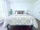 Bright bedroom boasts wood floors, large window, and modern decor at 9481 Highland Oak Dr # 1310, Tampa, FL 33647