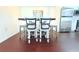 Charming dining area with counter seating and stylish decor; perfect for casual meals and entertaining at 9481 Highland Oak Dr # 1310, Tampa, FL 33647