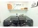 Samsung high-efficiency washer and dryer set with shelving at 9481 Highland Oak Dr # 1310, Tampa, FL 33647