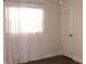 Bright bedroom featuring a closet and a window dressed with sheer curtains at 9705 45Th N Way, Pinellas Park, FL 33782