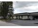 Community clubhouse featuring well-maintained grounds and a dedicated parking area for golf carts at 9705 45Th N Way, Pinellas Park, FL 33782