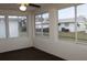 Enclosed Florida room with views of the backyard landscaping at 9705 45Th N Way, Pinellas Park, FL 33782