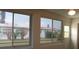 Enclosed Florida room with a view of the backyard at 9705 45Th N Way, Pinellas Park, FL 33782