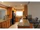 Updated kitchen with stainless steel appliances, granite countertops, and light wood cabinetry at 9705 45Th N Way, Pinellas Park, FL 33782