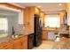 Well-designed kitchen with stainless steel appliances, granite counters, and ample cabinetry at 9705 45Th N Way, Pinellas Park, FL 33782