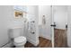 Bright bathroom features a modern toilet and a window at 4626 8Th S Ave, St Petersburg, FL 33711