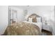 Inviting bedroom featuring neutral tones, wood flooring and modern decor at 4626 8Th S Ave, St Petersburg, FL 33711