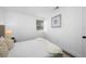 Bright, clean bedroom with soft lighting, plush bedding and hardwood floors at 4626 8Th S Ave, St Petersburg, FL 33711