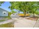 Well-maintained house with a gravel driveway and lush landscaping at 4626 8Th S Ave, St Petersburg, FL 33711