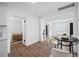 Open-concept living room with modern barstools and plenty of natural light at 4626 8Th S Ave, St Petersburg, FL 33711