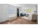 Cozy living room featuring wood floors, a comfortable couch, and modern decor at 4626 8Th S Ave, St Petersburg, FL 33711