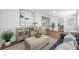 Inviting living room featuring stylish decor, wood floors, and ample natural light at 4626 8Th S Ave, St Petersburg, FL 33711