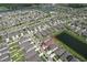 Wide aerial view showing this home's location near community lake and highway at 10308 Malvasia Ave, Riverview, FL 33578