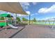Community playground with swings, play structure and lake views at 10308 Malvasia Ave, Riverview, FL 33578