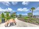 Community playground featuring picnic tables and beautiful lake views at 10308 Malvasia Ave, Riverview, FL 33578