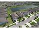 An aerial street view of several homes with well-manicured yards and landscaping at 10308 Malvasia Ave, Riverview, FL 33578