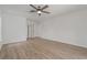 Spacious bedroom with laminate flooring and bright, white walls at 11411 Terrell, Spring Hill, FL 34606