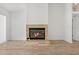 Bright living room features a fireplace with decorative surround at 11411 Terrell, Spring Hill, FL 34606
