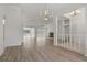 Open living room features a fireplace and flows into the sunroom and living areas at 11411 Terrell, Spring Hill, FL 34606