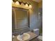 The bathroom has a sink, toilet, and shower at 12206 N 53Rd St, Temple Terrace, FL 33617