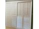 The closet features white shutter style doors at 12206 N 53Rd St, Temple Terrace, FL 33617