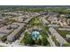 Aerial view showcasing community layout, pool area, and surrounding greenery at 12209 Glencliff Cir, Tampa, FL 33626