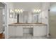 Spacious bathroom with dual sinks, vanity area, and a separate shower at 12209 Glencliff Cir, Tampa, FL 33626