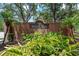 Welcoming Westchase brick community sign surrounded by lush tropical landscaping at 12209 Glencliff Cir, Tampa, FL 33626