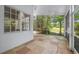 Screened-in patio with a view of the golf course with access to the golf course at 12209 Glencliff Cir, Tampa, FL 33626