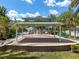 Community splash pad featuring water feature and covered seating area for residents' enjoyment at 12209 Glencliff Cir, Tampa, FL 33626