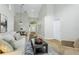 Inviting living room with high ceilings, open floor plan, and plenty of natural light at 12335 Glenfield Ave, Tampa, FL 33626