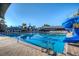 Community pool with a slide and plenty of room for swimming laps or just enjoying the water at 12335 Glenfield Ave, Tampa, FL 33626