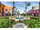 Westchase Town Center featuring attractive buildings, palm trees, and a decorative fountain at 12335 Glenfield Ave, Tampa, FL 33626