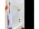 Clean bathroom featuring a tiled shower with a bright shower curtain at 1243 55Th N Ave, St Petersburg, FL 33703