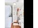 Cozy bathroom featuring a shower with subway tile, a modern vanity, and a convenient stackable washer and dryer at 1243 55Th N Ave, St Petersburg, FL 33703