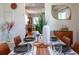 Cozy dining room with stylish decor, wood table, and view to the living room at 1243 55Th N Ave, St Petersburg, FL 33703