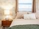 Bedroom featuring soft lighting, a neutral color palette, and a comfortable bed, creating a serene and inviting atmosphere at 1243 55Th N Ave, St Petersburg, FL 33703