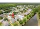 Aerial view of the property, highlighting its location near the pond and surrounding neighborhood at 12624 White Bluff Rd, Hudson, FL 34669