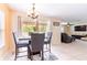 Cozy dining area with natural light and stylish furnishings at 12624 White Bluff Rd, Hudson, FL 34669
