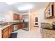 Modern kitchen with stainless steel appliances and ample counter space at 12624 White Bluff Rd, Hudson, FL 34669