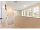 Bright staircase leading to the upper level of the home at 12624 White Bluff Rd, Hudson, FL 34669