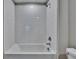 Close up on the shower featuring white subway tiles at 13187 Palmerston Rd, Riverview, FL 33579