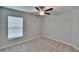 This bedroom has a ceiling fan and one window with blinds at 13187 Palmerston Rd, Riverview, FL 33579
