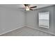 Bedroom featuring neutral walls, ceiling fan, and window at 13187 Palmerston Rd, Riverview, FL 33579