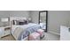 Bright main bedroom features a ceiling fan and large mirror at 13187 Palmerston Rd, Riverview, FL 33579