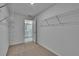 Walk-in closet with shelving, and view of en-suite bathroom at 13187 Palmerston Rd, Riverview, FL 33579