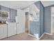 Laundry room with washer, dryer, and shower at 1415 Yale Dr, Holiday, FL 34691